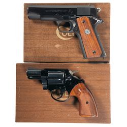 Two Colt Hand Guns