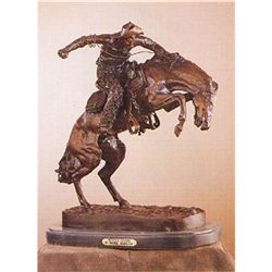 Wooly Chaps Bronze Sculpture by Frederic Remington. 8.5 H x 7 L x 4 W