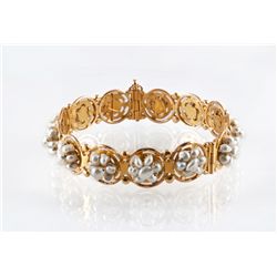 An Antique 22 Karat Gold and Natural Pearl Bracelet, Eastern Asia