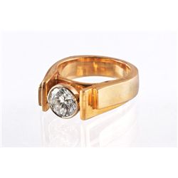 A Single Stone Diamond and 14 Karat Gold Ring
