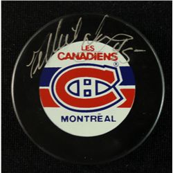Gilbert Dionne Signed Canadiens Logo Puck (Online COA)