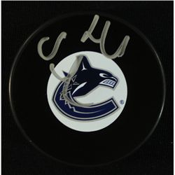 Henrik Sedin Signed Canucks Logo Puck (JSA COA)