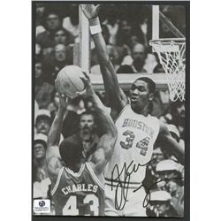 Hakeem Olajuwon Signed Rockets Vintage Magazine Photo (GA COA)