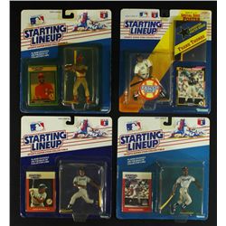 Lot of (4) Starting Lineup Figures: Ozzie Smith, Frank Thomas, Dave Winfield, Harold Baines