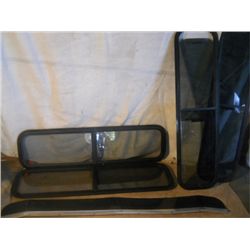 4 MISC CAMPER SHELL WINDOWS. TINTED