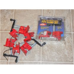 4 SETS OF PIPE CLAMPS