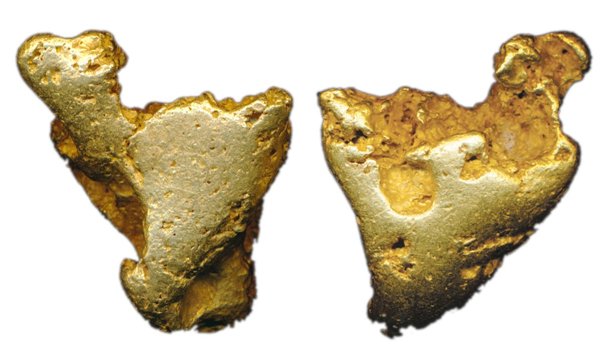 ALASKA GOLD NUGGET. A solid gold nugget. This chunky example has mostly ...