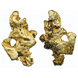 ALASKA GOLD NUGGET. A very rare solid gold nugget weighing more than fifteen troy ounces. Yellow-gol