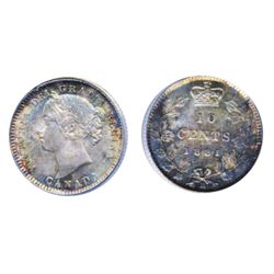 1881-H. PCGS graded Mint State-66. Lovely silver gray and rose patina, with blue highlights. Near fl