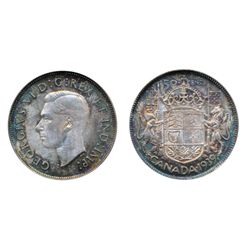 1939. ICCS Mint State-65. Beautiful rainbow toning over full underlying luster.