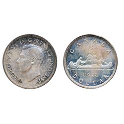 1947. Maple Leaf. Single ‘H.P.’ variety. PCGS graded Mint State-64. Lightly toned in shades of blue 