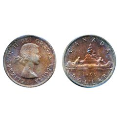 1960. ICCS Mint State-65. Even, rich iridescent gem toning.