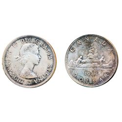 1961. ICCS Mint State-65. Attractive issue and rare date in gem condition. Very light, attractive to