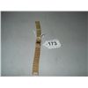 Image 1 : Gold colored watch