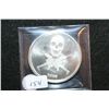 Image 1 : 2009 Skull & Machine Gun Silver Round; .999 Fine Silver 1 Oz.