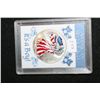 Image 1 : 1999 Colorized Silver Eagle $1; "It's A Boy"