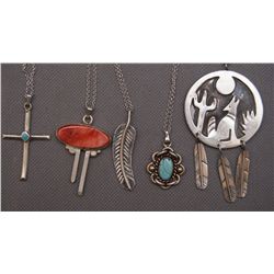FIVE NAVAJO PENDANTS AND CHAINS