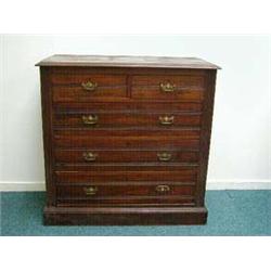 Edwardian walnut chest fitted two short above