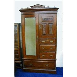 Edwardian walnut compactum wardrobe, the carv