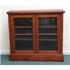 Image 1 : Oak dwarf bookcase, fitted a pair of glazed d