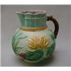 Image 1 : Majolica floral jug decorated in blues, yello