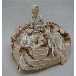 Small hand painted pin cushion doll with fril