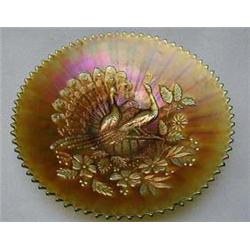 Green and purple frilled Carnival glass dish