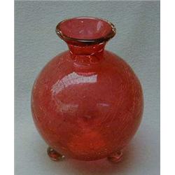 Bulbous cranberry crackle glass vase on three