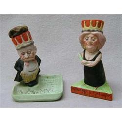 Two continental bisque political pin cushion