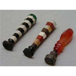 Three assorted multicoloured hardstone and si