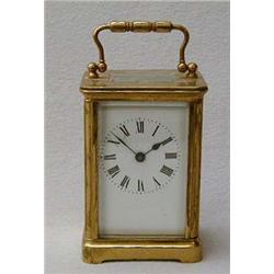 Small brass carriage clock presented to Capta