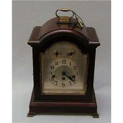 Edwardian mahogany bracket clock on brass fee