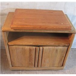 SMALL ROLLING CUPBOARD WITH SWIVEL STAND ON TOP