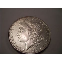 1899 MORGAN SILVER DOLLAR, AU-55