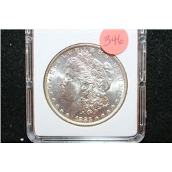 1883-O Silver Morgan $1; MCPCG Graded MS63