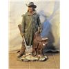 Image 1 : Cast Mountain Man With His Rifle Holding Saddle