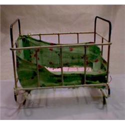 Bed for dolls made of tin, length 10 cm. NOK