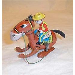 Horse with rider (cowboy), made of tin, Mikun