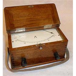 Volt meter in wooden box, marked 1304709 bmr,