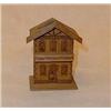 Image 1 : Saving box of wood shaped as a house, h 9 cm.