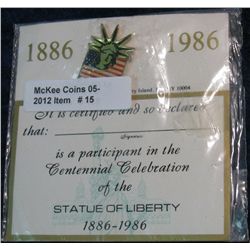 15. 1886-1986 Pinback and Badge for the Centennial Celebration of the Statue of Liberty.