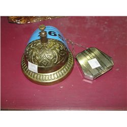 Brass bell and small metal cosmetic case