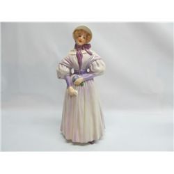 Goebel figurine of young lady in purple.