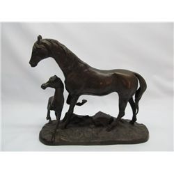 Cast metal figure of mare and colt.