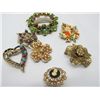 Image 1 : Selection of brooches.