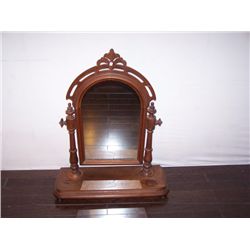 Mahongany shaving mirror.