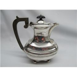 Hallmarked sterling tea pot.