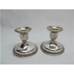 Pair of sterling candlesticks.