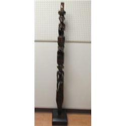 Carved trail marker.