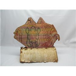 Native stone plaque on brich bark base.